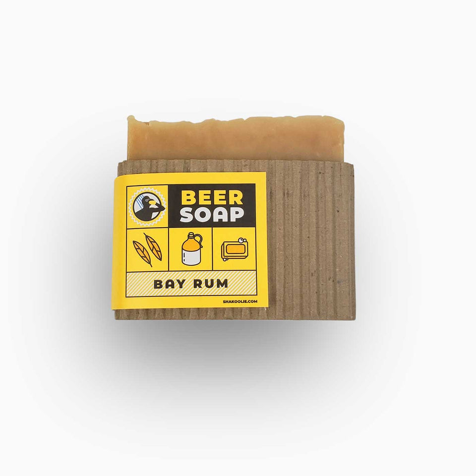 Product is a handmade bar soap with a "Bay Rum" scent. Product is made using "Bud Light" lager. Soap is brownish in color with a cardboard wrap and beer soap label.